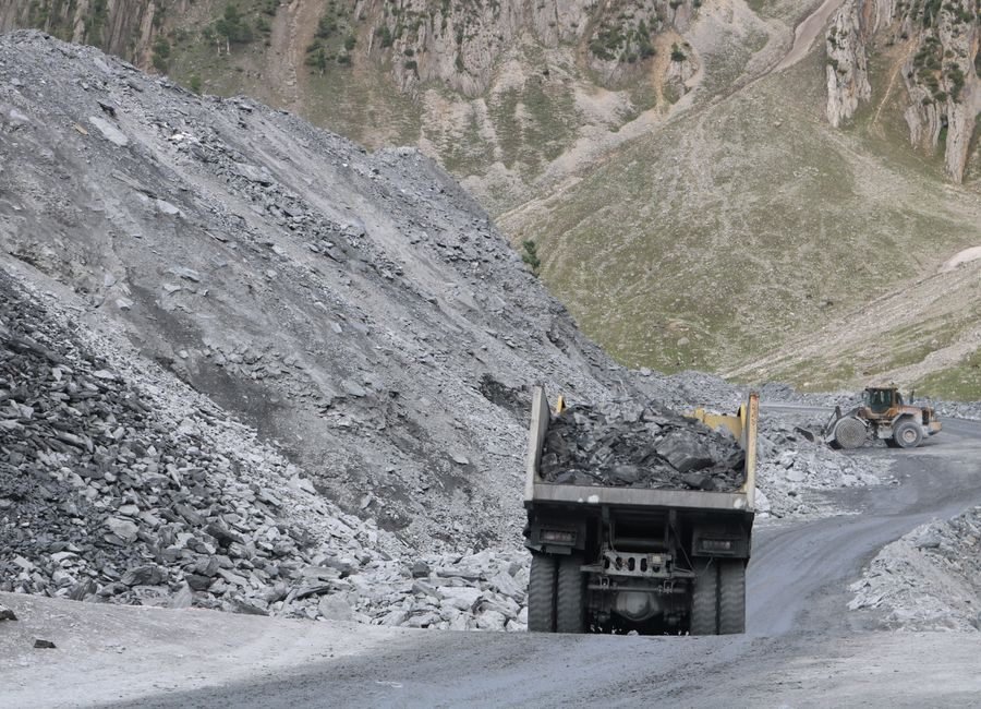 Heavy truck carrying coal on the road